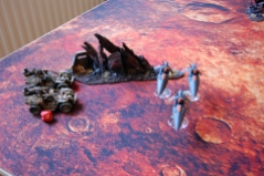 The Elysians respond to the raider's advance by moving around the flank of the Jetbikes. By moving more than 10" the Tauros buggies get a 5+ invulnerable save until their next turn!